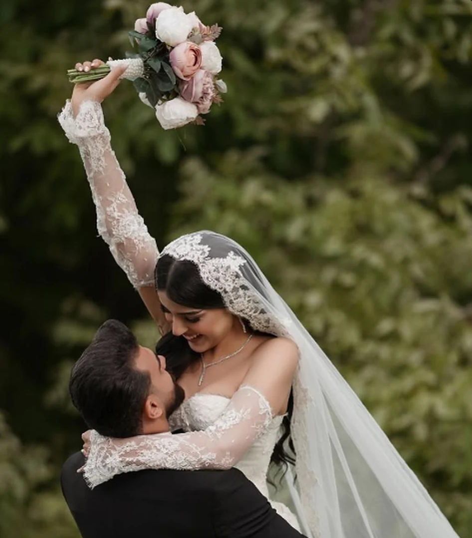 Adam and María celebrating together